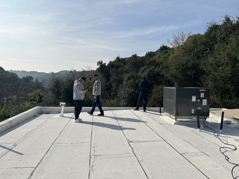 Slide of KAT Roofing