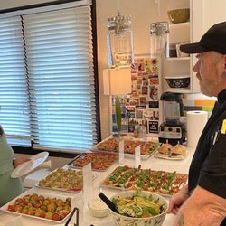 GMarket Chef - Chef Brandon presenting the food to our guests.