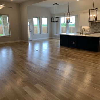 Zuriel Flooring - Living room and kitchen finished flooring - Flooring Near Me Zuriel Flooring - Living room and kitchen finished flooring - Flooring Near Me