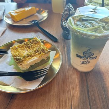 Sana'a Cafe - Matcha latte no flavor and pistachio milk cake - Coffee & Tea Near Me - Elk Grove, California Sana'a Cafe - Matcha latte no flavor and pistachio milk cake - Coffee & Tea Near Me - Elk Grove, California