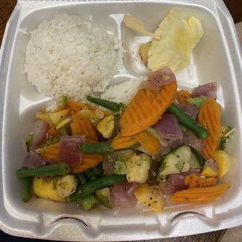 Hawaiian Bros Island Grill - Seasoned rice on a bed of white rice with a side of white rice and a side of pineapple. - Hawaiian Near Me - Owasso, Oklahoma Hawaiian Bros Island Grill - Seasoned rice on a bed of white rice with a side of white rice and a side of pineapple. - Hawaiian Near Me - Owasso, Oklahoma