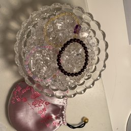 I got the yellow and colorful one. Garnet is my old one. And cute pink pouch they gave me. That's the bowl of quartz to recharge! I got the yellow and colorful one. Garnet is my old one. And cute pink pouch they gave me. That's the bowl of quartz to recharge!