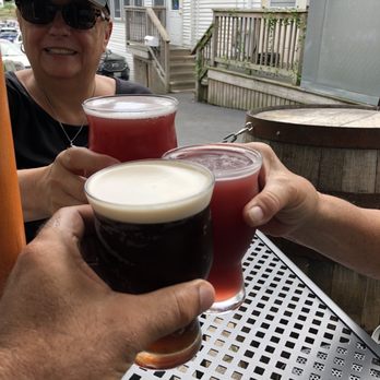 Boothbay Craft Brewery - Toasting with Why so Blue and Danny Boy beer - New American Near Me - Boothbay, Maine