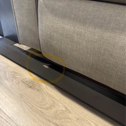 Removed couch to fix the USB port in armrest & chipped the wood beneath it. also did not bolt the couch back down to the ground Removed couch to fix the USB port in armrest & chipped the wood beneath it. also did not bolt the couch back down to the ground