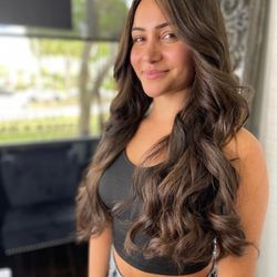 Mane Changes Salon - conditioning treatment with a great layered cut, on this brunettewith beautiful curls