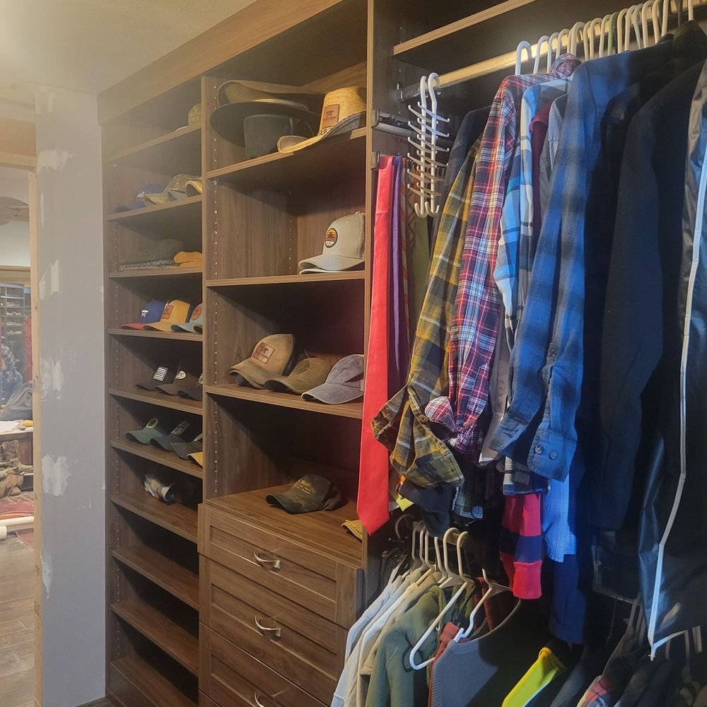 Hubby's side of the closet is finally organized,  exactly as we designed. So happy with Closet & Storage!
