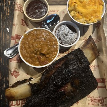 Bludso's BBQ - Dinosaur beef rib Mac & Cheese - Half Pint Baked Beans - Half Pint - Barbeque Near Me - Los Angeles, California Bludso's BBQ - Dinosaur beef rib Mac & Cheese - Half Pint Baked Beans - Half Pint - Barbeque Near Me - Los Angeles, California