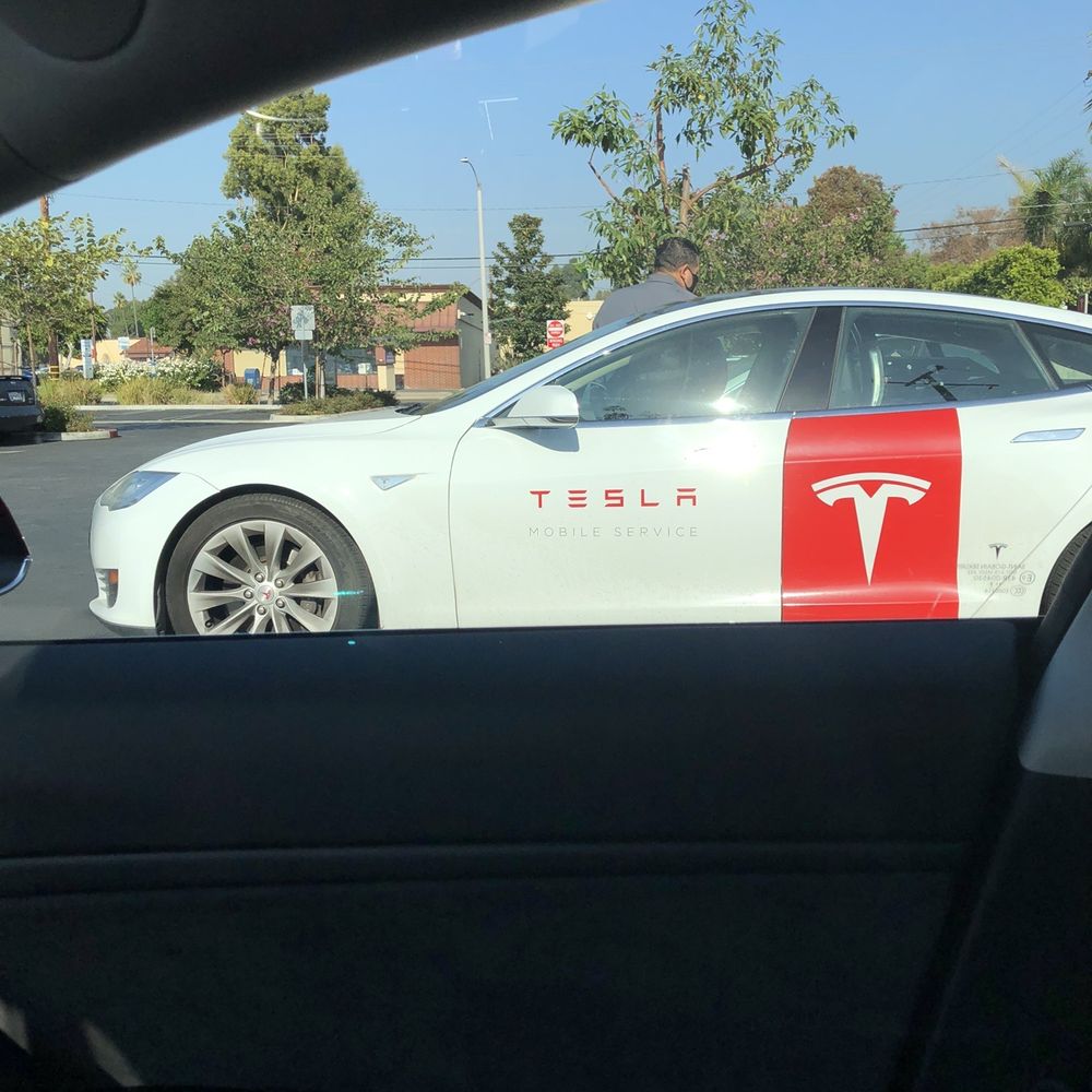 Tesla Supercharger - Tesla's here to give free service Tire's wiper fluid - EV Charging Stations Near Me - Downey, California