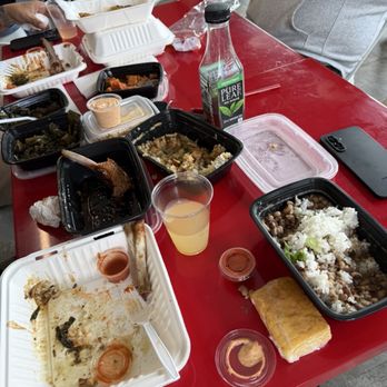 Rain City Market - I forgot to take pictures BEFORE we began to eat! Oops! Check out the sides in the black dishes...those come with the combos!!!! - Grocery Near Me - Renton, Washington Rain City Market - I forgot to take pictures BEFORE we began to eat! Oops! Check out the sides in the black dishes...those come with the combos!!!! - Grocery Near Me - Renton, Washington