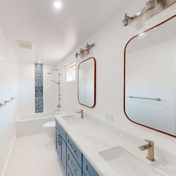 Redo Spaces Construction - a bathroom with two sinks and a bathtub - General Contractors Near Me - Walnut Creek, California Redo Spaces Construction - a bathroom with two sinks and a bathtub - General Contractors Near Me - Walnut Creek, California