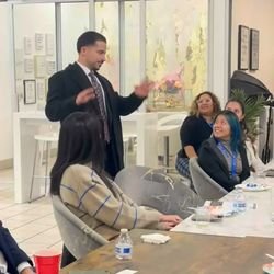 Coast Village Group - Speaking during a conference