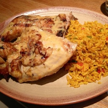 Nando's Peri-Peri - 1/2 chicken with Portuguese rice - Portuguese Near Me - Arlington, Virginia Nando's Peri-Peri - 1/2 chicken with Portuguese rice - Portuguese Near Me - Arlington, Virginia