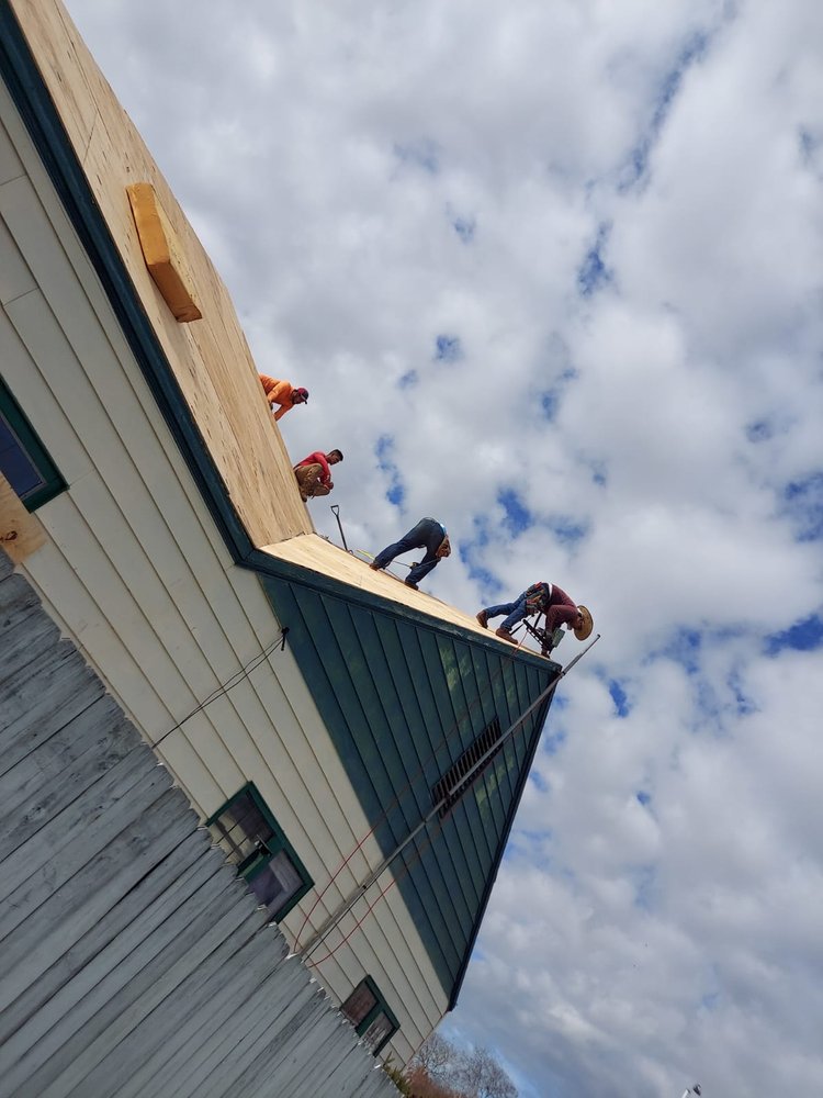 Slide of Daniel's Roofing and Painting