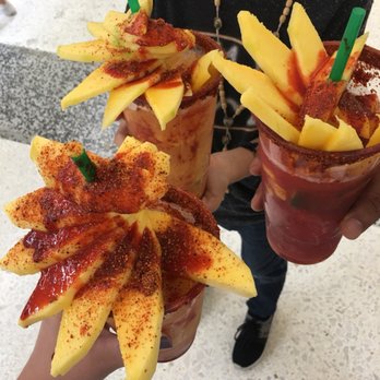 Squiz-Up - a person holding two cups of food - Juice Bars & Smoothies Near Me - SAN BERNARDINO, California Squiz-Up - a person holding two cups of food - Juice Bars & Smoothies Near Me - SAN BERNARDINO, California