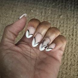 Nails done by Tracy. This is at 2 weeks. Nails done by Tracy. This is at 2 weeks.