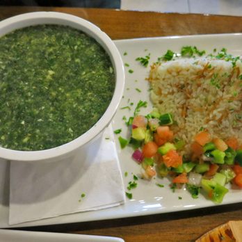 Masrawy Egyptian Kitchen - Mulukhiyah / Molokhia (herbacious soup, served with Egyptian rice & vermicelli and Masrawy salad) - Egyptian Near Me - Mississauga, Ontario Masrawy Egyptian Kitchen - Mulukhiyah / Molokhia (herbacious soup, served with Egyptian rice & vermicelli and Masrawy salad) - Egyptian Near Me - Mississauga, Ontario