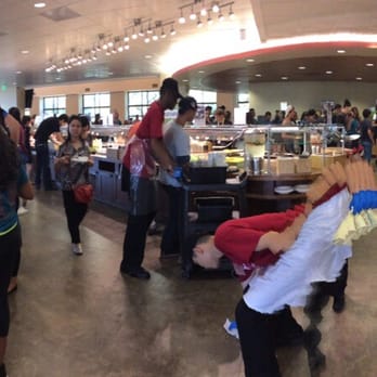 Arrillaga Nights - people walking through a food court - American Near Me - Stanford, California Arrillaga Nights - people walking through a food court - American Near Me - Stanford, California