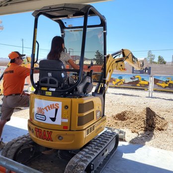 Dig This - Instructor and my daughter operating the machine - Amusement Parks Near Me - Las Vegas, Nevada