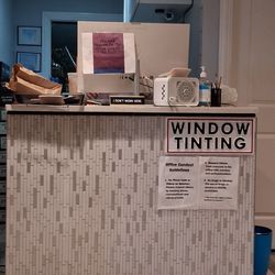 Auto Glass Solutions - Front desk with rule guidelines.