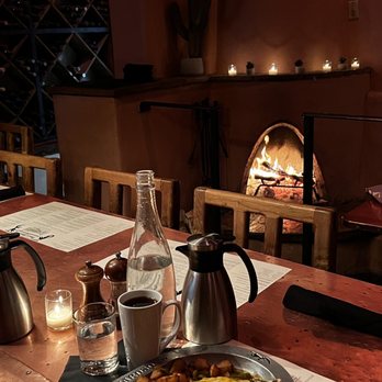 Dick's Hideaway - back room family table at Dick's Hideaway with kiva fireplace, rustic wine racks and my favorite breakfast burrito! - Breakfast & Brunch Near Me - Phoenix, Arizona Dick's Hideaway - back room family table at Dick's Hideaway with kiva fireplace, rustic wine racks and my favorite breakfast burrito! - Breakfast & Brunch Near Me - Phoenix, Arizona