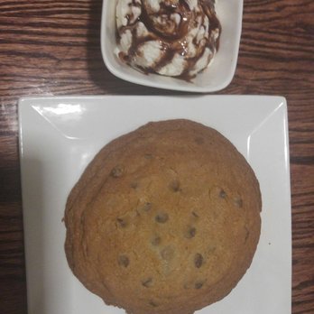 Mookie's BBQ - Warm Cookie and vanilla ice cream with chocolate sauce (on the side) per your request.. - Barbeque Near Me - Great Falls, Virginia
