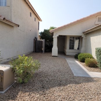 Visual Paradise Landscaping - a gravel driveway with bushes and shrubs - Landscaping Near Me Visual Paradise Landscaping - a gravel driveway with bushes and shrubs - Landscaping Near Me