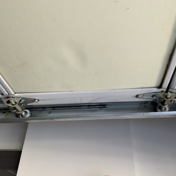 Dogtag Garage Door - After replacement of old reels - Garage Door Services Near Me Dogtag Garage Door - After replacement of old reels - Garage Door Services Near Me