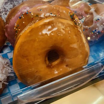 Bozo Foods - a variety of donuts in a display case - Burgers Near Me - Boardman, Oregon Bozo Foods - a variety of donuts in a display case - Burgers Near Me - Boardman, Oregon