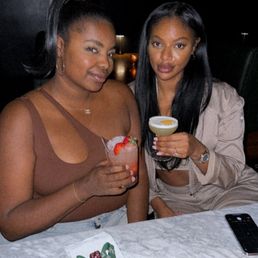 2 Besties enjoying their cocktails 2 Besties enjoying their cocktails