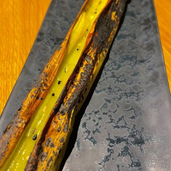 avin - Grilled leek served with a coffee miso dipping sauce - Tapas Bars Near Me - Munich, BY