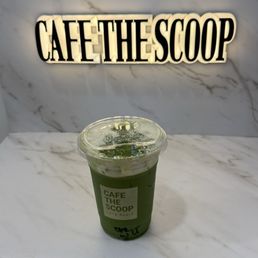 Banana matcha latte with added cream top. Banana matcha latte with added cream top.