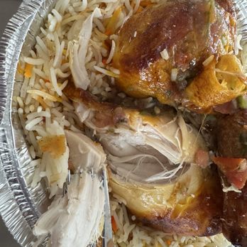 Dar Al-Yemen - 1/2 roasted chicken over rice $17 - Middle Eastern Near Me - Queens, New York Dar Al-Yemen - 1/2 roasted chicken over rice $17 - Middle Eastern Near Me - Queens, New York