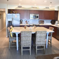 BeachFront Bliss Villas - The Balboa Villa.
Fully equipped Kitchen with oversized quartz Island that seats 6. Have dinner or play games around it!