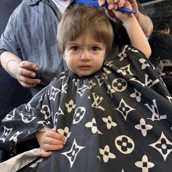 The Rugged Studio - My son nervous for his first cut and Chuy putting him at ease!