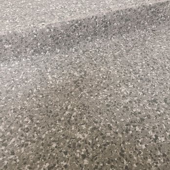 Garage Monkeyz - a closeup of a garage floor - Flooring Near Me - Austin, Texas