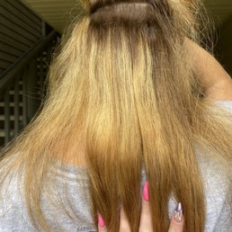Picture of my hair the day after. The bottom section was darker than my mid section and the color was brought up to my roots.