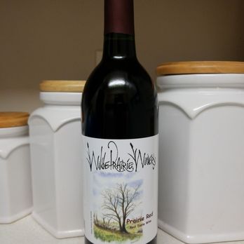 Wilde Prairie Winery - a bottle of wine on a counter - Wineries Near Me - Brandon, South Dakota