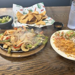 Shrimp fajitas with all the trimmings. Yum!
