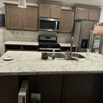 Granite Planet - Old top-mount stainless steel sink & cheap faucet - General Contractors Near Me - Tucson, Arizona
