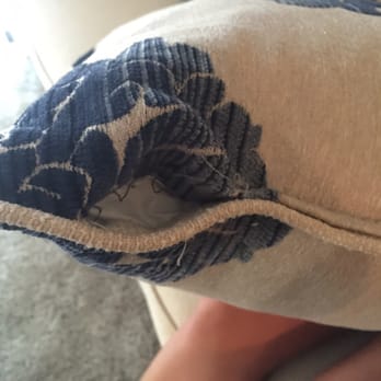 RC Willey - Pillows come with holes. This photo was taken immediately after the couches were delivered. - Furniture Stores Near Me - Rocklin, California