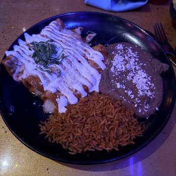 Cantina Tequila - Queso enchiladas that were so delicious and cheesy. Paired well with the salsa, rice, and beans! 10 out of 10! Cream sauce  was saucin! - Mexican Near Me - Henderson, Nevada
