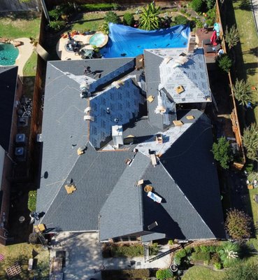 REAL Roofing and Construction Logo