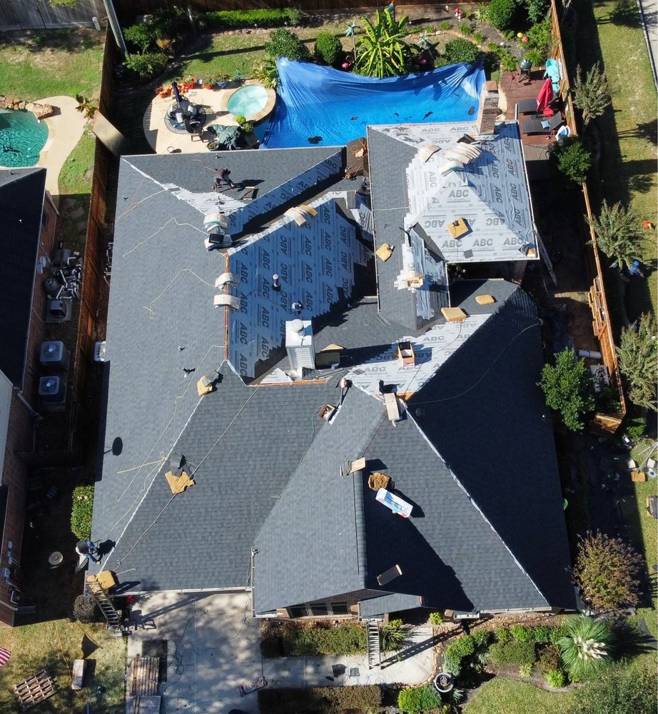 Slide of REAL Roofing and Construction