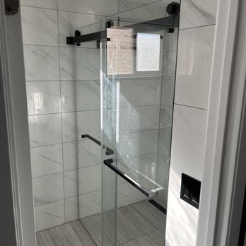 RP Quality Construction - a glass shower door - General Contractors Near Me RP Quality Construction - a glass shower door - General Contractors Near Me