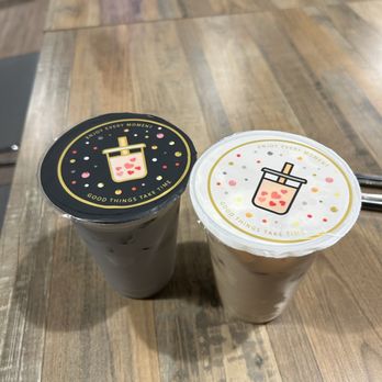 Ding Tea - two cups of coffee on a wooden table - Coffee & Tea Near Me - Taylorsville, Utah