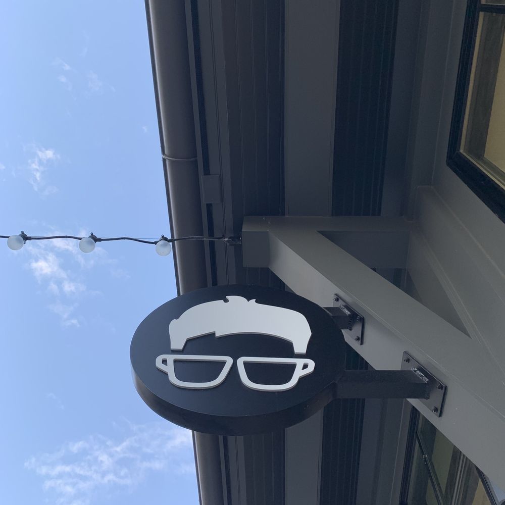 Gregorys Coffee - Exterior sign -- with each bag of roast coffee Gregorys donates a pair of eye glasses - Coffee & Tea Near Me - Darien, Connecticut