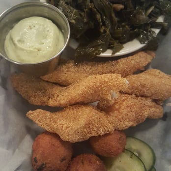 High Hat Cafe - Catfish basket with braised greens and hush puppies - Southern Near Me - New Orleans, Louisiana