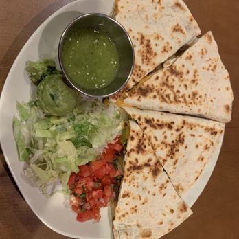 Veggie Grill by Next Level - My favorite dish. Vegan quesadillas. Fake cheese and guacamole and lettuce and pico. Pretty Filling. - Vegan Near Me - Long Beach, California