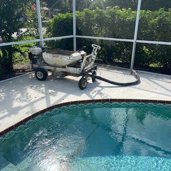 Limaco - a pool being cleaned by a pressurer - Masonry/Concrete Near Me Limaco - a pool being cleaned by a pressurer - Masonry/Concrete Near Me