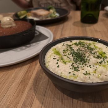 Husk - Cornbread & grits - American Near Me - Charleston, South Carolina Husk - Cornbread & grits - American Near Me - Charleston, South Carolina